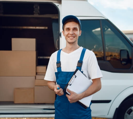 deliveryman-in-uniform-carton-boxes-in-the-car