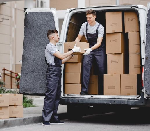 two-young-handsome-movers-wearing-uniforms
